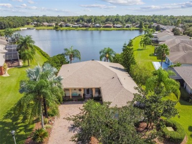 Under contract-accepting backup offers. Stunning WATERFRONT on Stonegate Golf Club in Florida - for sale on GolfHomes.com, golf home, golf lot