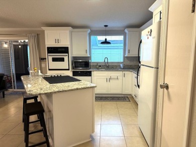 TOP OF THE LINE HOME! Welcome to this gorgeous 2-bedroom on Schalamar Creek Golf and Country Club in Florida - for sale on GolfHomes.com, golf home, golf lot