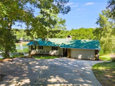 Stunning lake views in a gated community. This beautiful 3 on Fairfield Plantation Golf and Country Club in Georgia - for sale on GolfHomes.com, golf home, golf lot