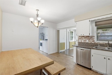 Updates Galore!!! 2 Bedroom, 2 bath with attached carport, METAL on Citrus Springs Country Club in Florida - for sale on GolfHomes.com, golf home, golf lot