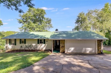 Stunning lake views in a gated community. This beautiful 3 on Fairfield Plantation Golf and Country Club in Georgia - for sale on GolfHomes.com, golf home, golf lot