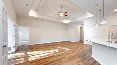 This stunning 4-bedroom, 2-bath single-family home offers the on Palmetto Greens Golf and Country Club in South Carolina - for sale on GolfHomes.com, golf home, golf lot