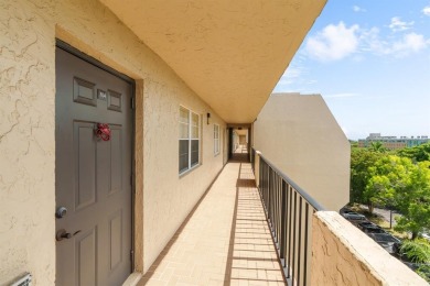 Welcome to elevated living ~ literally. This 2-bedroom on Grande Oaks Golf Club in Florida - for sale on GolfHomes.com, golf home, golf lot