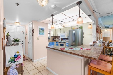Welcome to elevated living ~ literally. This 2-bedroom on Grande Oaks Golf Club in Florida - for sale on GolfHomes.com, golf home, golf lot