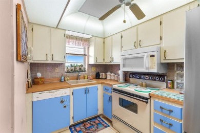 Welcome to elevated living ~ literally. This 2-bedroom on Grande Oaks Golf Club in Florida - for sale on GolfHomes.com, golf home, golf lot