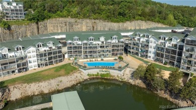 Enjoy breathtaking views of the lake from this stunning on The Club At Old Kinderhook in Missouri - for sale on GolfHomes.com, golf home, golf lot