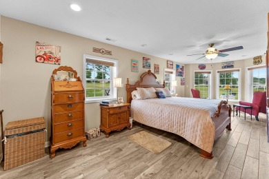 Welcome to 407 Kahite Trail, a stunning golf-front home, located on Tellico Village -The Links At Kahite Golf Course in Tennessee - for sale on GolfHomes.com, golf home, golf lot