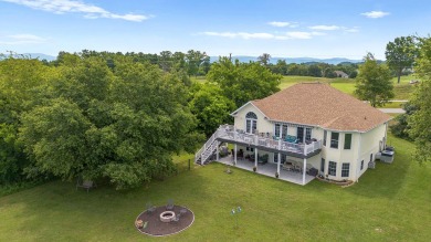 Welcome to 407 Kahite Trail, a stunning golf-front home, located on Tellico Village -The Links At Kahite Golf Course in Tennessee - for sale on GolfHomes.com, golf home, golf lot