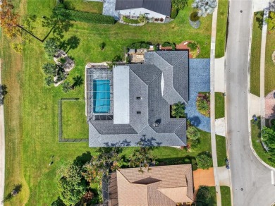 Welcome to 10182 Boca Woods Ln, Boca Raton, FL 33428--where on Boca Woods Country Club in Florida - for sale on GolfHomes.com, golf home, golf lot