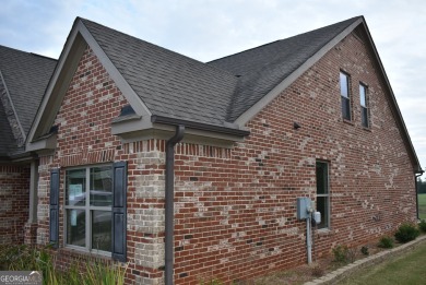 A stunning 4-sided brick ranch home perfectly situated within on Crystal Lake Golf and Country Club in Georgia - for sale on GolfHomes.com, golf home, golf lot