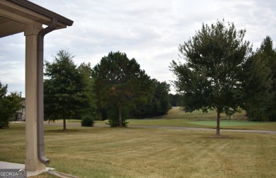 A stunning 4-sided brick ranch home perfectly situated within on Crystal Lake Golf and Country Club in Georgia - for sale on GolfHomes.com, golf home, golf lot