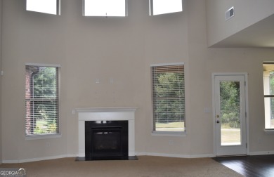 A stunning 4-sided brick ranch home perfectly situated within on Crystal Lake Golf and Country Club in Georgia - for sale on GolfHomes.com, golf home, golf lot