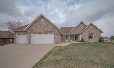 Welcome to this stunning 4-bedroom, 3-bathroom home boasting on Whispering Creek Golf Club in Iowa - for sale on GolfHomes.com, golf home, golf lot