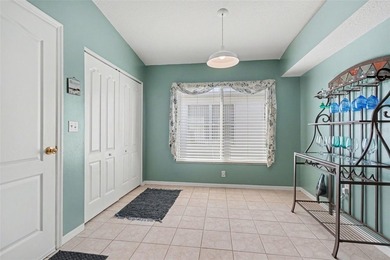 Experience relaxed Florida living in this well-maintained on Tampa Bay Golf and Country Club in Florida - for sale on GolfHomes.com, golf home, golf lot