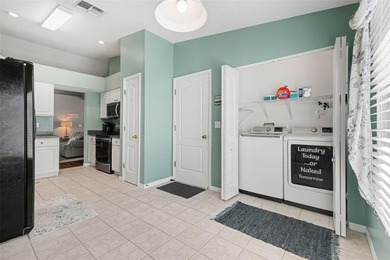 Experience relaxed Florida living in this well-maintained on Tampa Bay Golf and Country Club in Florida - for sale on GolfHomes.com, golf home, golf lot