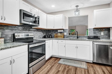 Tucked away behind a private fence, this beautifully updated on Mesquite Municipal Golf Course in Texas - for sale on GolfHomes.com, golf home, golf lot