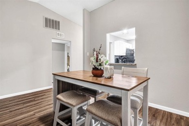 Tucked away behind a private fence, this beautifully updated on Mesquite Municipal Golf Course in Texas - for sale on GolfHomes.com, golf home, golf lot