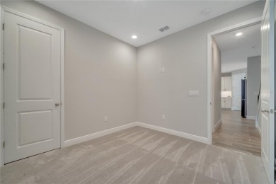 One or more photo(s) has been virtually staged. One or more on Eagle Creek Golf Club in Florida - for sale on GolfHomes.com, golf home, golf lot