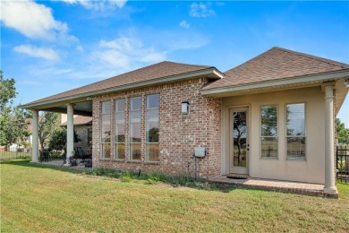 In the gated Masters Point community of Oak Harbor, this on Oak Harbor Golf Club in Louisiana - for sale on GolfHomes.com, golf home, golf lot