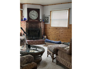 Charming and well-kept 2 bed 1 bath home in a desirable location on Les Cheneaux Golf Club in Michigan - for sale on GolfHomes.com, golf home, golf lot