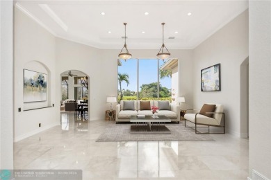 Step into luxury as you enter this estate home, where 14' volume on Heron Bay Golf Club in Florida - for sale on GolfHomes.com, golf home, golf lot