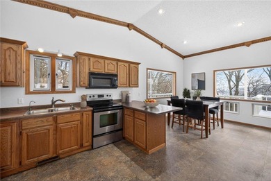 Nestled among the distinctive homes surrounding Coffee Mill Golf on Coffee Mill Golf and Country Club in Minnesota - for sale on GolfHomes.com, golf home, golf lot