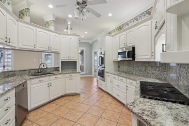 BETTER THAN NEW...This beautiful custom built fully updated home on Pecan Plantation Country Club in Texas - for sale on GolfHomes.com, golf home, golf lot