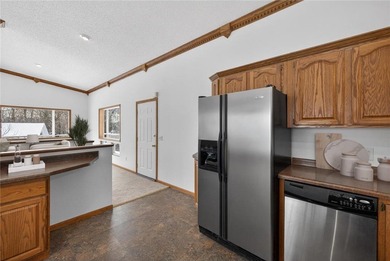 Nestled among the distinctive homes surrounding Coffee Mill Golf on Coffee Mill Golf and Country Club in Minnesota - for sale on GolfHomes.com, golf home, golf lot