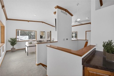 Nestled among the distinctive homes surrounding Coffee Mill Golf on Coffee Mill Golf and Country Club in Minnesota - for sale on GolfHomes.com, golf home, golf lot