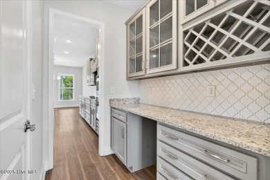 Discover this beautiful 4-bedroom, 2.5-bath home in the highly on Crow Creek Golf Club in North Carolina - for sale on GolfHomes.com, golf home, golf lot