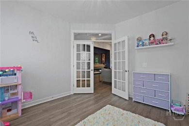 This stunning 4-bed, 3.5-bath in the gated Savannah Quarters on Savannah Quarters Country Club in Georgia - for sale on GolfHomes.com, golf home, golf lot