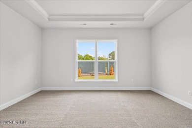 Discover this beautiful 4-bedroom, 2.5-bath home in the highly on Crow Creek Golf Club in North Carolina - for sale on GolfHomes.com, golf home, golf lot