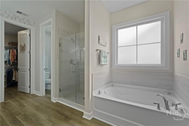 This stunning 4-bed, 3.5-bath in the gated Savannah Quarters on Savannah Quarters Country Club in Georgia - for sale on GolfHomes.com, golf home, golf lot