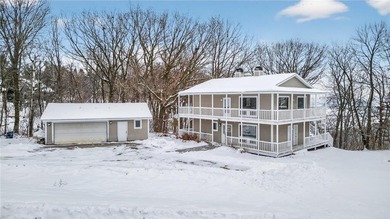 Nestled among the distinctive homes surrounding Coffee Mill Golf on Coffee Mill Golf and Country Club in Minnesota - for sale on GolfHomes.com, golf home, golf lot