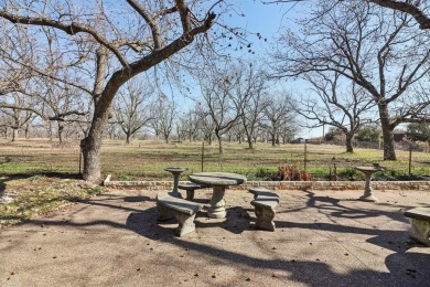 BETTER THAN NEW...This beautiful custom built fully updated home on Pecan Plantation Country Club in Texas - for sale on GolfHomes.com, golf home, golf lot