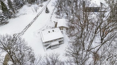 Nestled among the distinctive homes surrounding Coffee Mill Golf on Coffee Mill Golf and Country Club in Minnesota - for sale on GolfHomes.com, golf home, golf lot