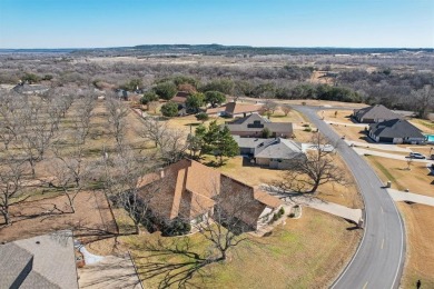 BETTER THAN NEW...This beautiful custom built fully updated home on Pecan Plantation Country Club in Texas - for sale on GolfHomes.com, golf home, golf lot