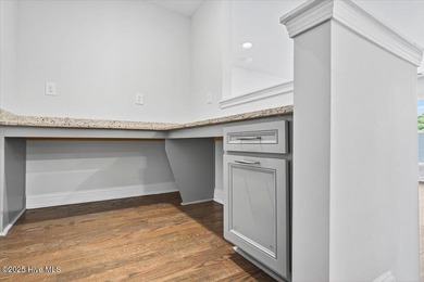 Experience elevated coastal living in this luxury 4-bedroom home on Crow Creek Golf Club in North Carolina - for sale on GolfHomes.com, golf home, golf lot