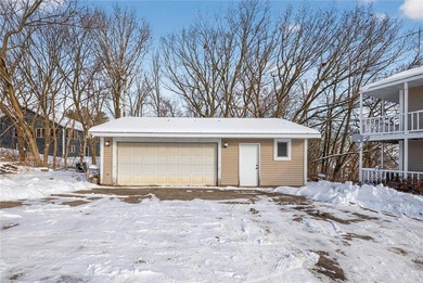 Nestled among the distinctive homes surrounding Coffee Mill Golf on Coffee Mill Golf and Country Club in Minnesota - for sale on GolfHomes.com, golf home, golf lot