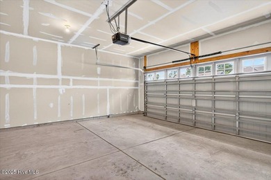 Experience elevated coastal living in this luxury 4-bedroom home on Crow Creek Golf Club in North Carolina - for sale on GolfHomes.com, golf home, golf lot