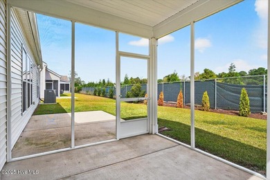 Experience elevated coastal living in this luxury 4-bedroom home on Crow Creek Golf Club in North Carolina - for sale on GolfHomes.com, golf home, golf lot
