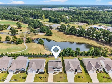 Experience elevated coastal living in this luxury 4-bedroom home on Crow Creek Golf Club in North Carolina - for sale on GolfHomes.com, golf home, golf lot