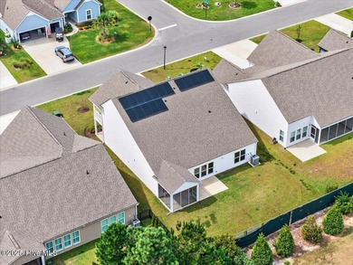 Experience elevated coastal living in this luxury 4-bedroom home on Crow Creek Golf Club in North Carolina - for sale on GolfHomes.com, golf home, golf lot