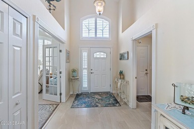 Lovingly adorned by the current owners, ICI's expanded Cayman on Plantation Bay Golf and Country Club in Florida - for sale on GolfHomes.com, golf home, golf lot