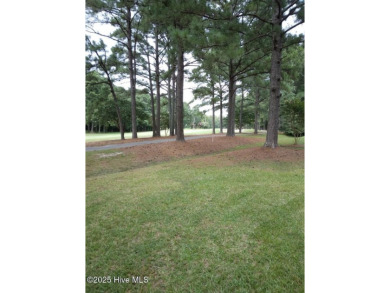 Make this beautiful  over half acre homesite in the master on Sound Golf Links at Albemarle Plantation in North Carolina - for sale on GolfHomes.com, golf home, golf lot