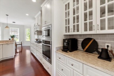 Experience elevated living in this custom-built Cape Cod home on Pete Dye River Course of Virginia Tech in Virginia - for sale on GolfHomes.com, golf home, golf lot