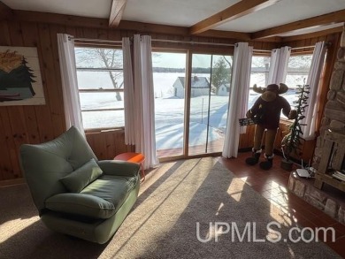 Enjoy the quaint rustic ambience of this northwoods cottage on Wyandotte Hills Golf Course in Michigan - for sale on GolfHomes.com, golf home, golf lot
