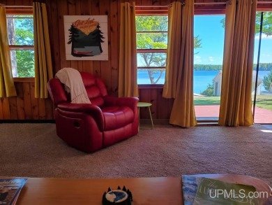 Enjoy the quaint rustic ambience of this northwoods cottage on Wyandotte Hills Golf Course in Michigan - for sale on GolfHomes.com, golf home, golf lot