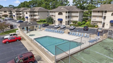 Welcome to Your Dream Condo! This ground floor one bedroom, one on Harbour View Par 3 and Driving Range in South Carolina - for sale on GolfHomes.com, golf home, golf lot