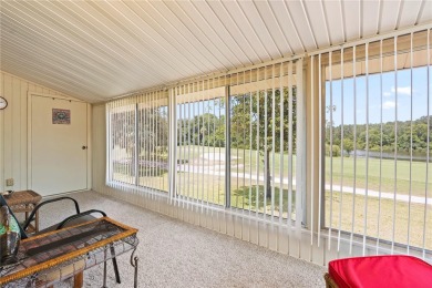 Wake up to stunning views of Jade Lake, the 11th Green of the on Country Club At Silver Springs Shores in Florida - for sale on GolfHomes.com, golf home, golf lot